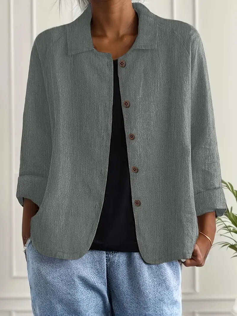 Giacca donna grigia casual elegante con collo alto e bottoni, ideale per primavera autunno. Stile moderno e confortevole.