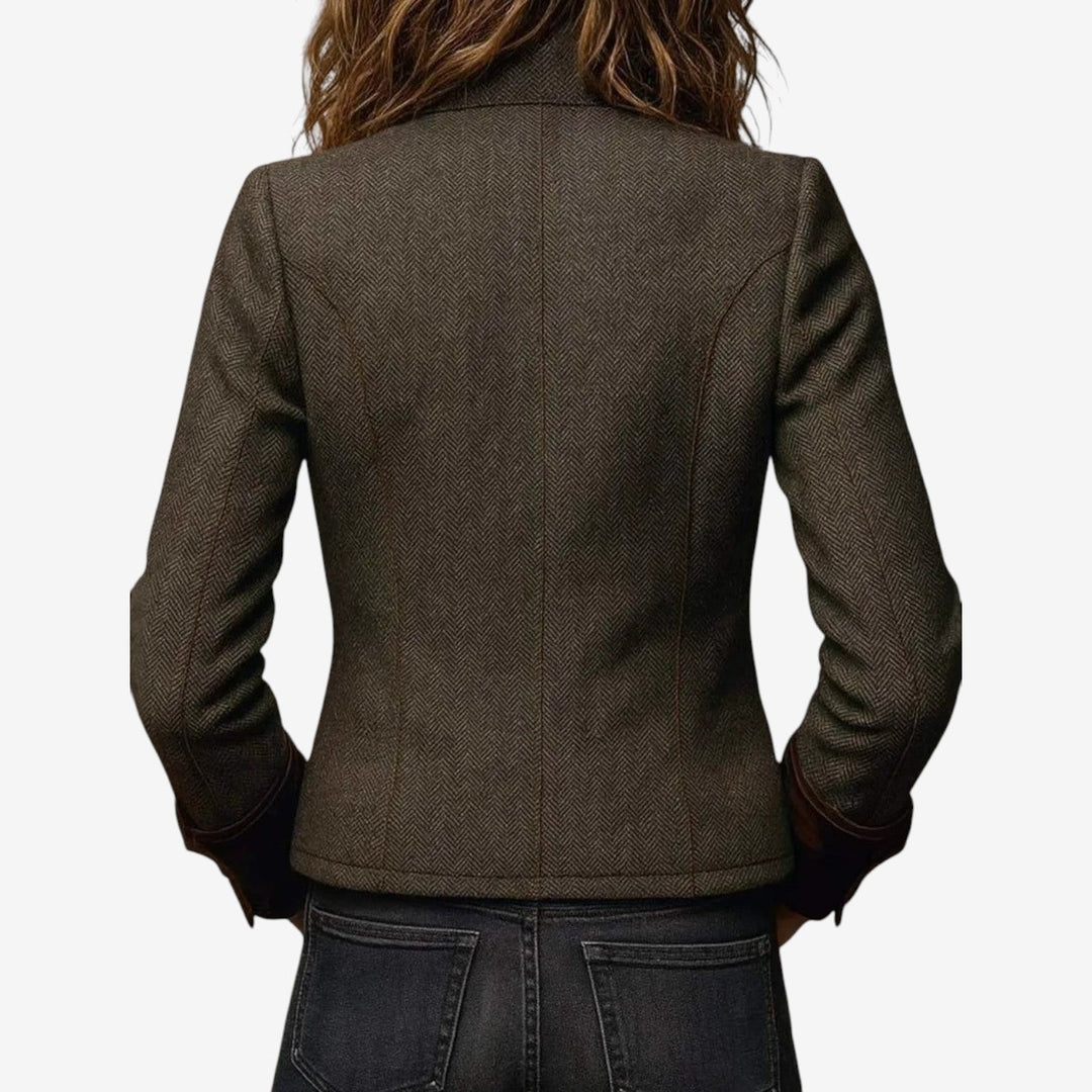 Giacca donna verde scuro strutturata, capospalla elegante e versatile per abbigliamento femminile di tendenza.