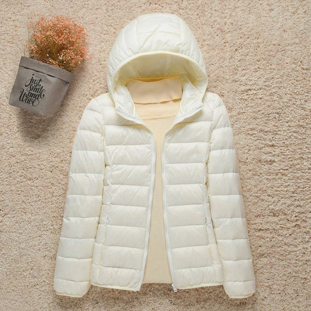 Capospalla donna trapuntato con zip frontale, giacca calda e alla moda per l'inverno.
