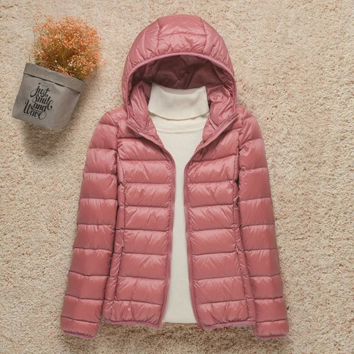 Giacca invernale donna trapuntata con zip, design moderno per un look casual o raffinato.