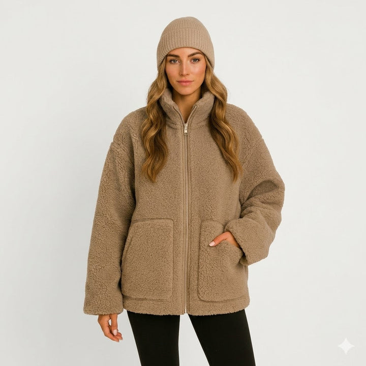 Giacca donna oversize morbida e calda, perfetta per l'inverno e l'autunno. Stile casual ed elegante.
