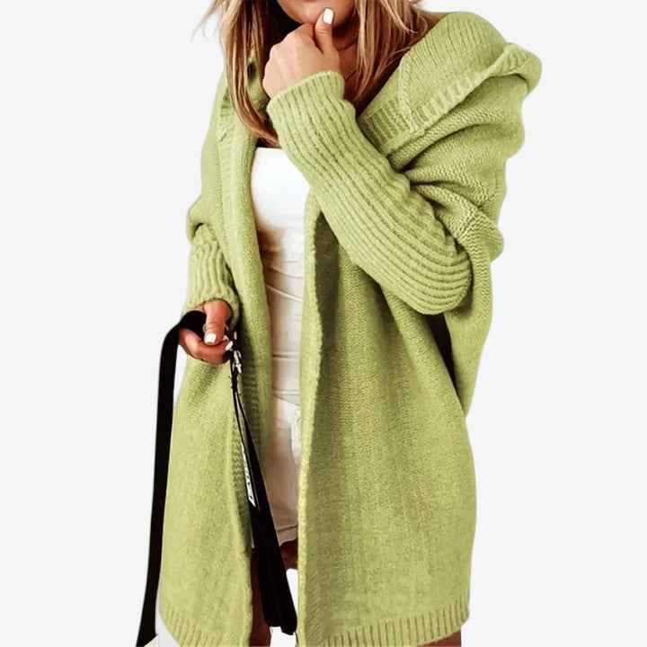 Cardigan lungo donna con cappuccio, perfetto per moda invernale. Gilet oversize colorato per stile casual e comfort.