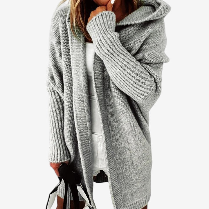 Gilet donna lungo e oversize con cappuccio. Un cardigan versatile per comfort autunnale e look casual moderni.