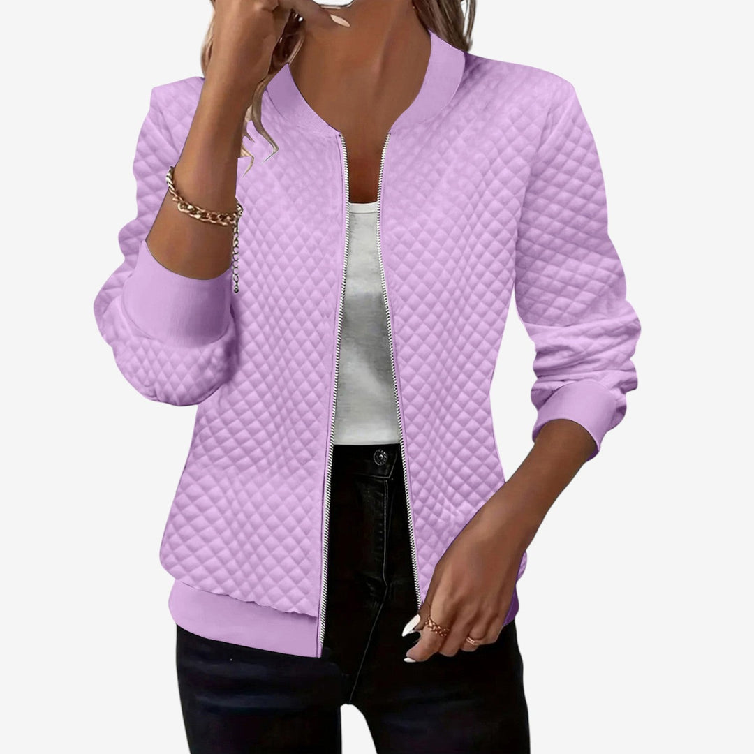 Gilet donna trapuntato con cerniera frontale e collo alto, un capo versatile per l'abbigliamento autunno/inverno.