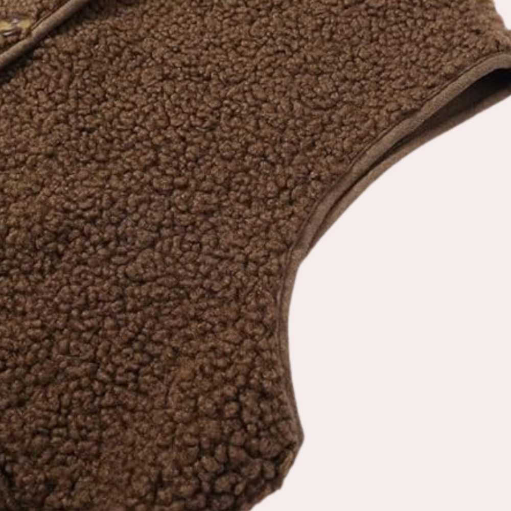 Gilet caldo da donna in sherpa marrone, con bottoni, perfetto per affrontare il freddo con stile trendy.