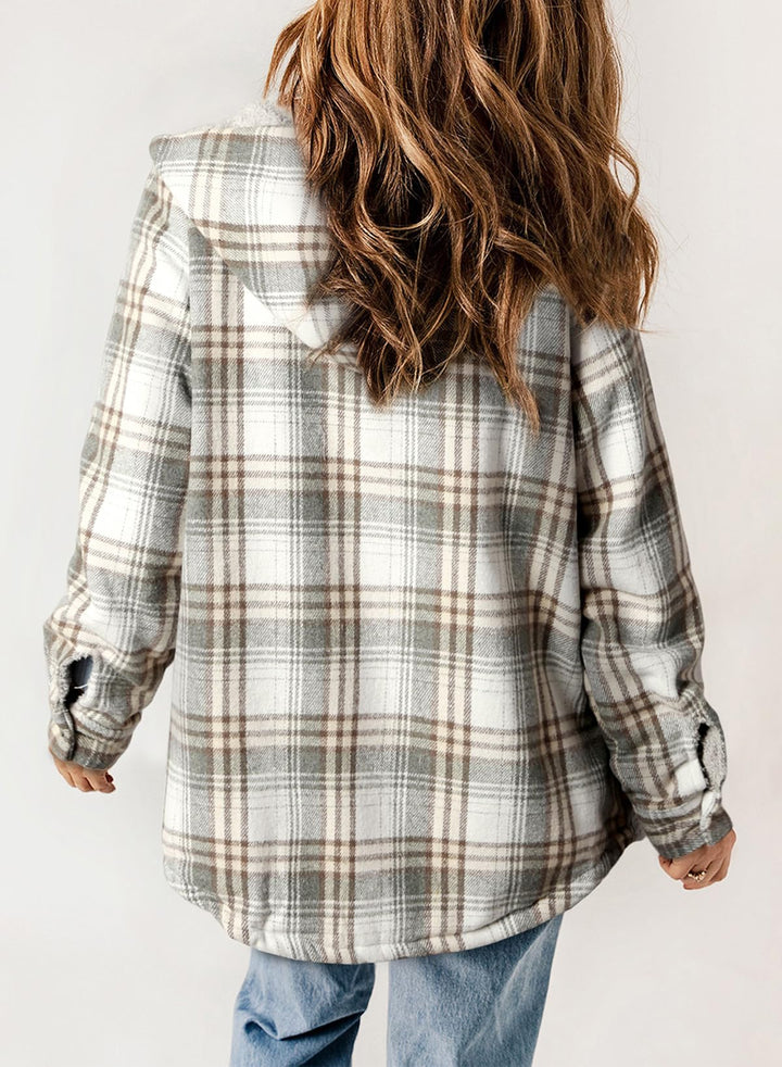 Giacca donna con cappuccio e dettagli a quadri, un must-have per l'inverno.