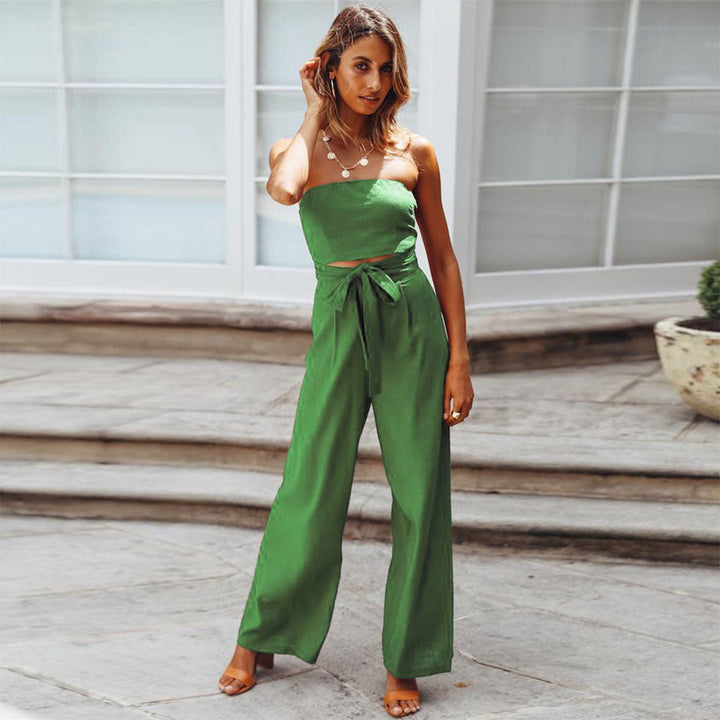 Tuta estiva elegante donna con bustier, gamba larga e nodo in vita. Ideale per outfit casual chic.
