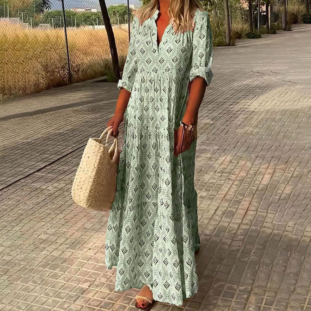 Maxi dress donna estivo, fluido e senza maniche, con scollo a V per un look casual-elegante in vacanza.