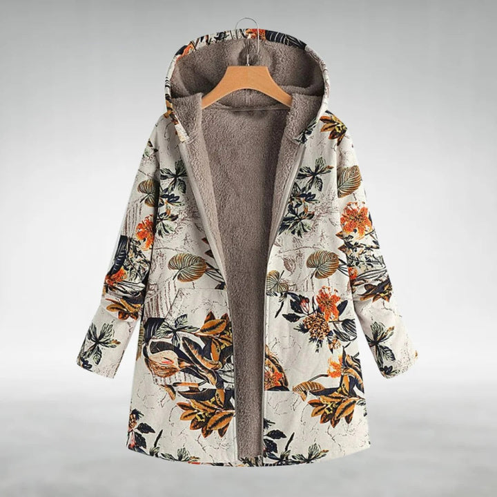 Morbida giacca lunga donna floreale con cappuccio, comfort e stile per autunno. Colori grigio e bianco.