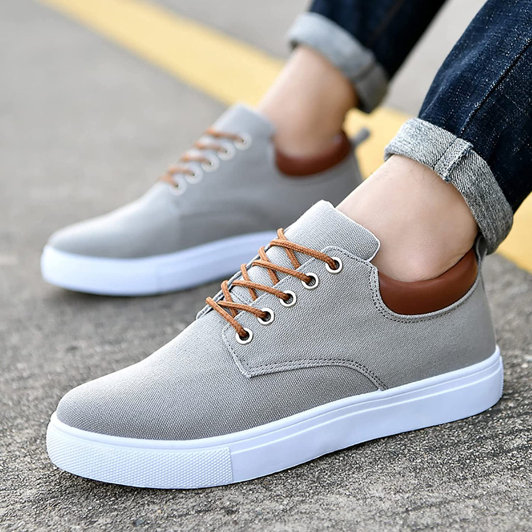 Sneakers moda uomo, calzature comode per look sportivo urbano, con lacci e dettagli unici.