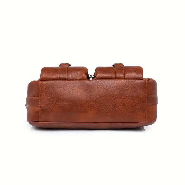Borsa a tracolla in sintetico resistente, design multitasche e versatile, accessorio moda per outfit donna.