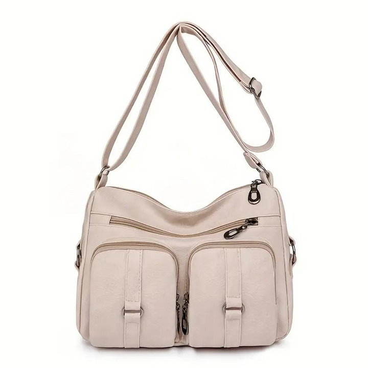 Profilo borsa a tracolla donna multitasche, spaziosa e compatta, per organizzare gli effetti personali con stile.