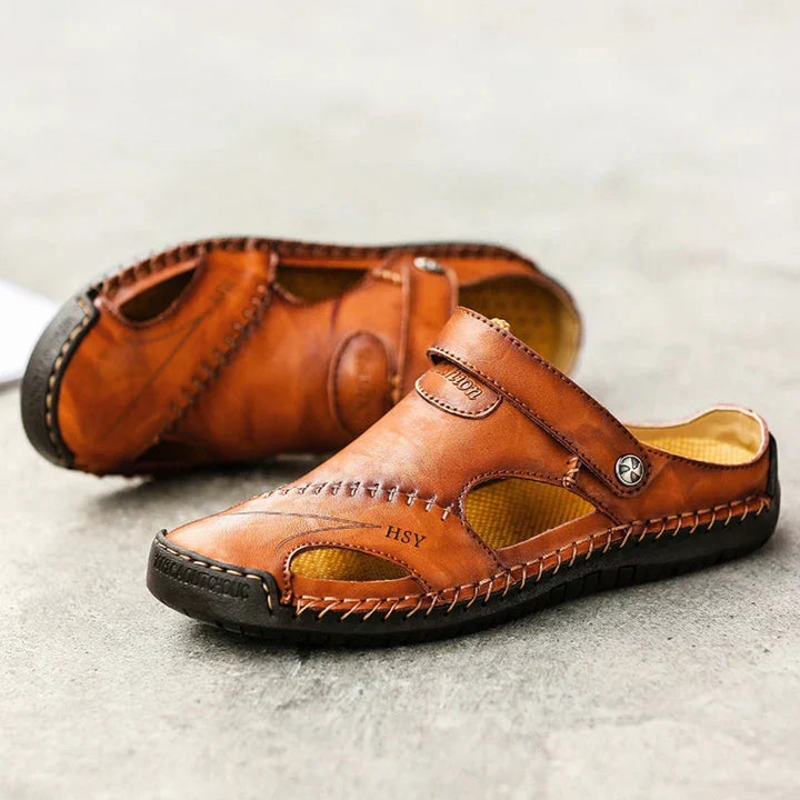 Sandali uomo ergonomici con plantare ammortizzato, ideali per il benessere del piede e comfort estivo.