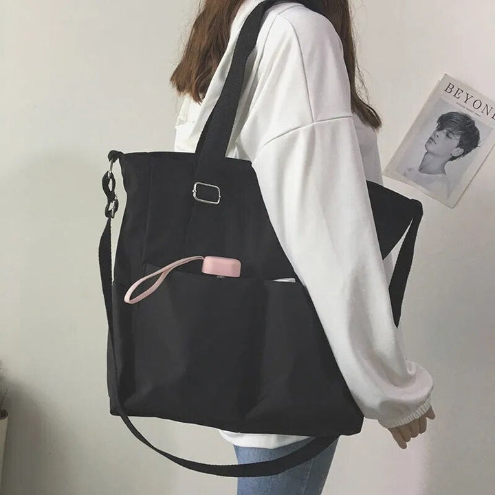 Borsa mare tote donna multicolore, spaziosa e trendy per accessori da spiaggia. Grande e funzionale.