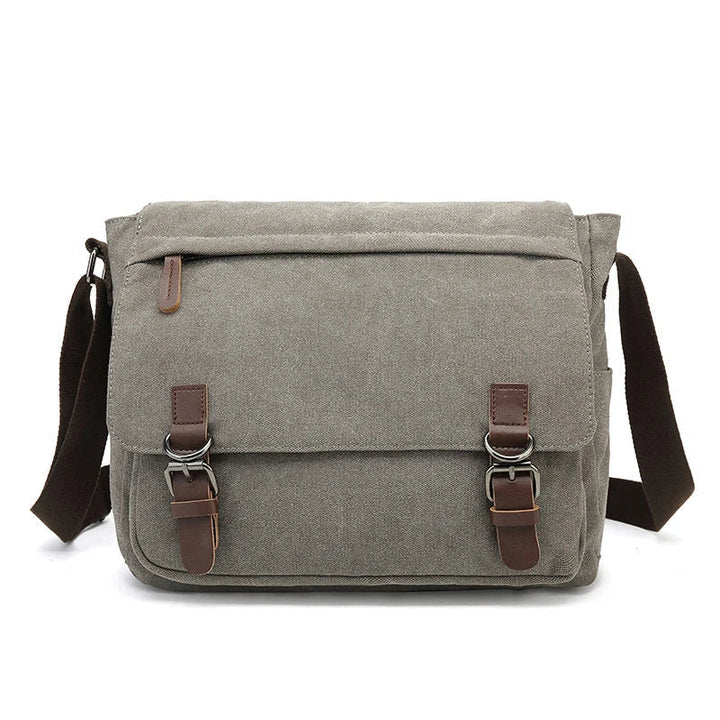 Borsa a tracolla uomo robusta in tela, ideale per viaggi e lavoro quotidiano.