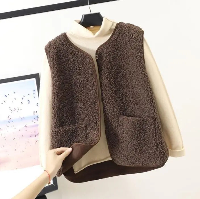Gilet smanicato da donna in pile caldo e comodo, ideale per l'autunno e l'inverno.