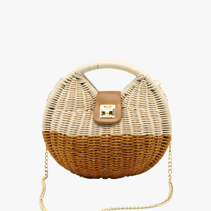Borsa in paglia naturale da donna, forma rotonda, con tracolla, accessorio must-have per l'estate.
