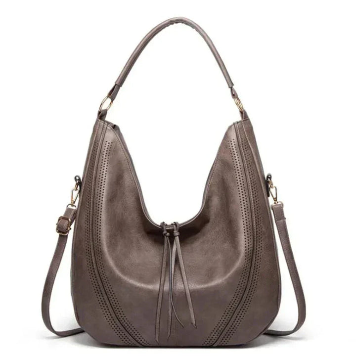 Borsa a tracolla da donna in velluto a coste, elegante con nappine, ideale per un look alla moda.