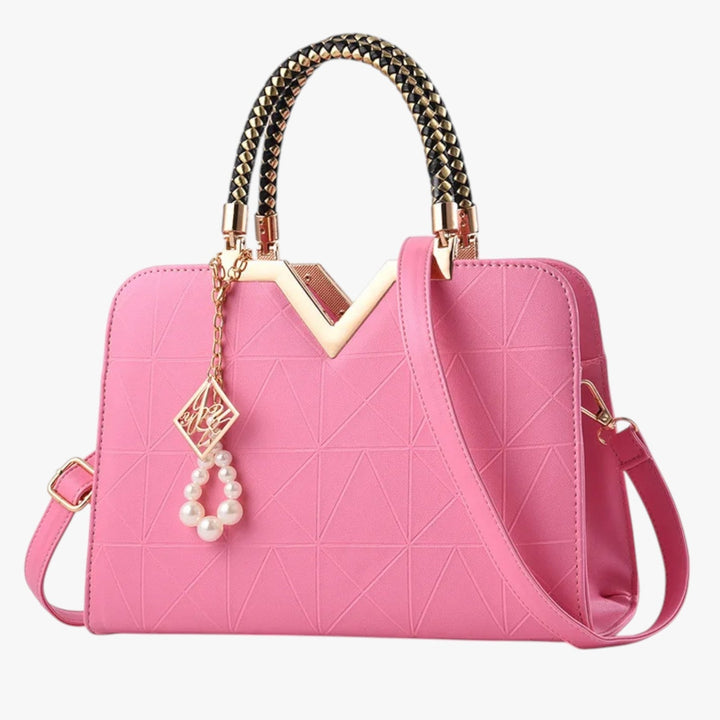 Borsa a mano donna multicolore con manici gioiello, accessorio vivace ed elegante.
