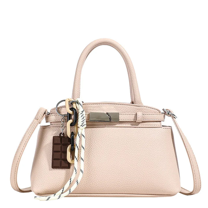 Borsa a conchiglia da donna, piccola borsetta chic per la sera. Accessorio moda versatile.