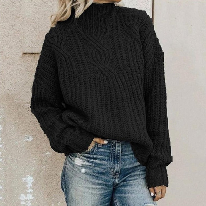 Elegante maglione donna a collo alto nero, perfetto per un outfit invernale versatile e sofisticato. Caldo e di tendenza.