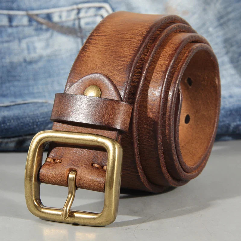 Cintura uomo artigianale in pelle per jeans con fibbia in ottone massiccio. Accessorio casual elegante.