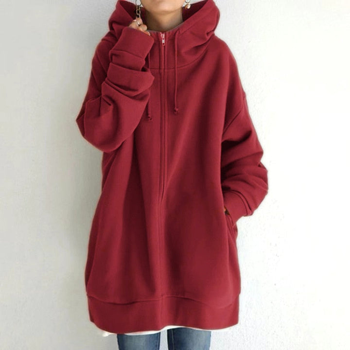 Felpa calda donna con cappuccio. Comfort e stile per la moda casual, essenziale per il guardaroba autunno inverno.