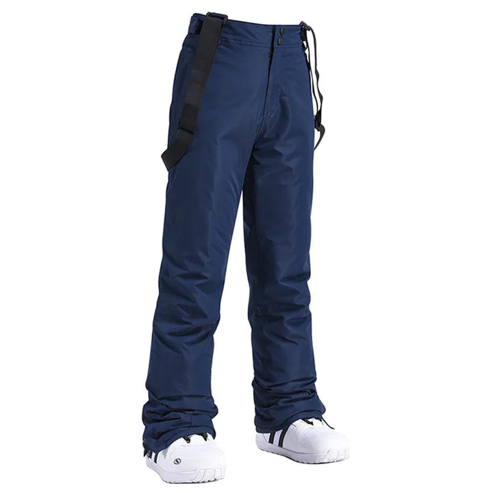 Pantaloni antivento uomo per la neve, da sci e snowboard, con bretelle regolabili e alta visibilità.