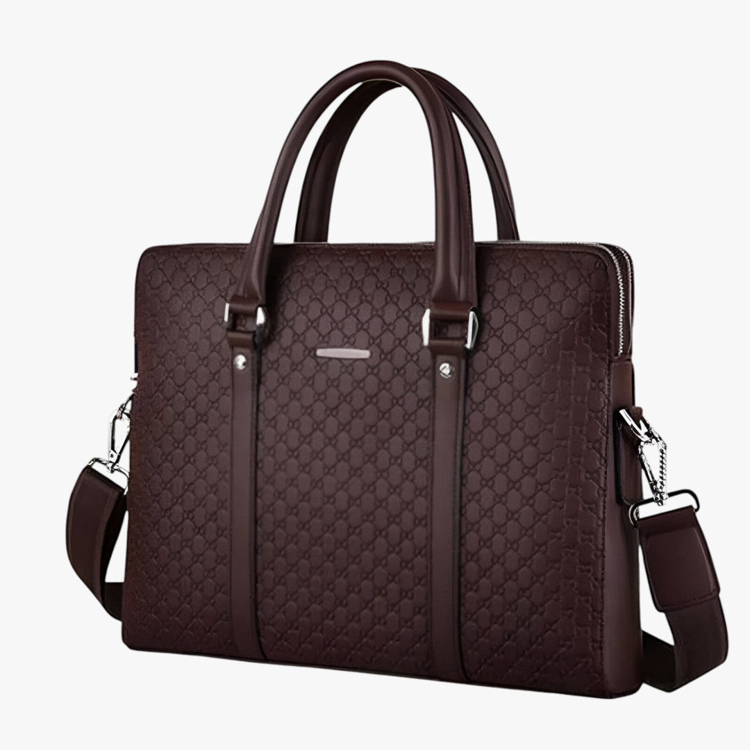 Interno organizzato di borsa porta laptop uomo, con scomparti imbottiti per notebook e accessori.