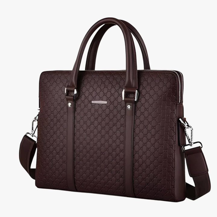 Interno organizzato di borsa porta laptop uomo, con scomparti imbottiti per notebook e accessori.