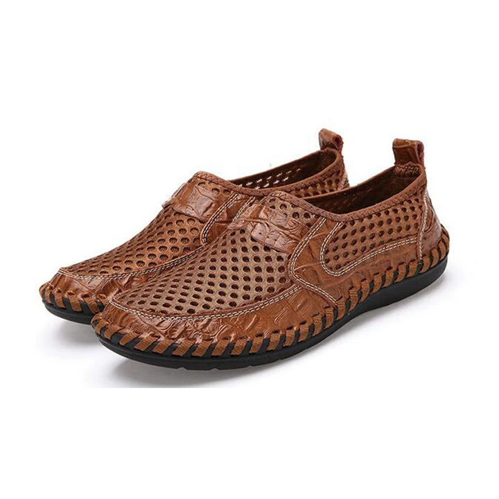 Sneakers uomo slip-on leggere e flessibili, ideali per passeggio e comfort quotidiano grazie all'ammortizzazione.