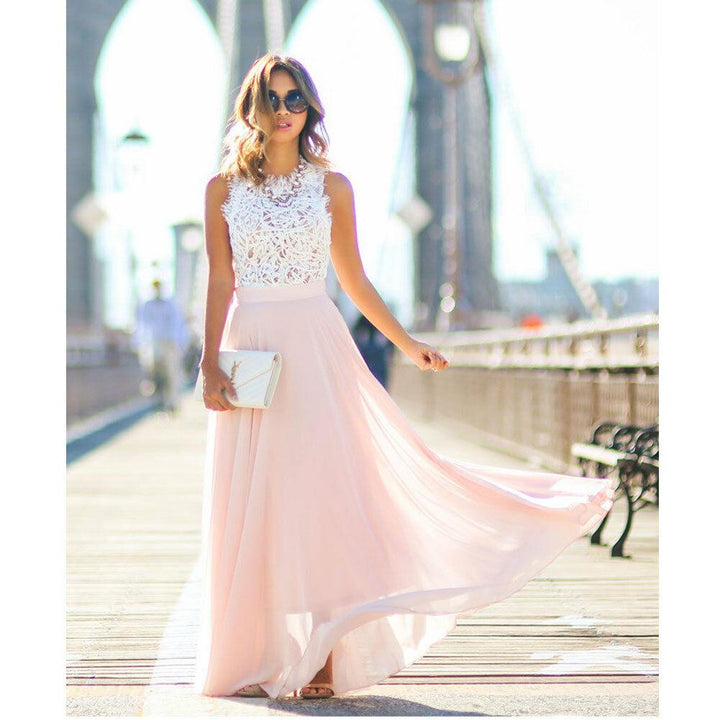 Abito lungo estivo da donna rosa, elegante e chic per un outfit estivo alla moda. Ideale per la stagione.