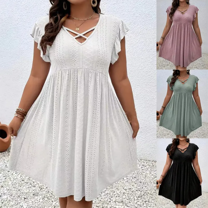 Semplice ed elegante mini abito donna estivo casual con scollo a V, maniche corte, vestibilità comoda.