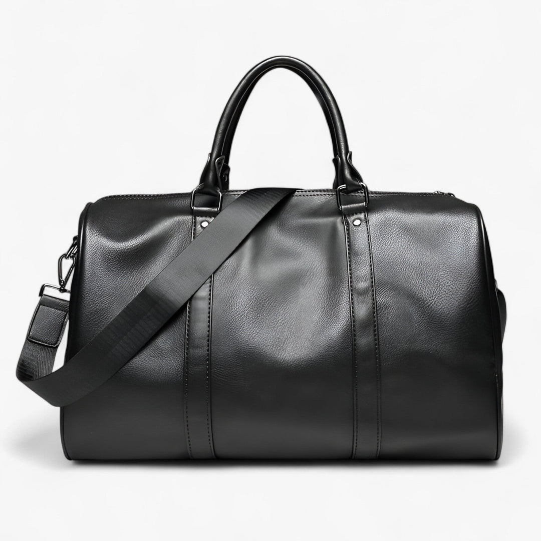Borsone viaggio uomo nero, resistente, con tracolla removibile per comfort e versatilità.