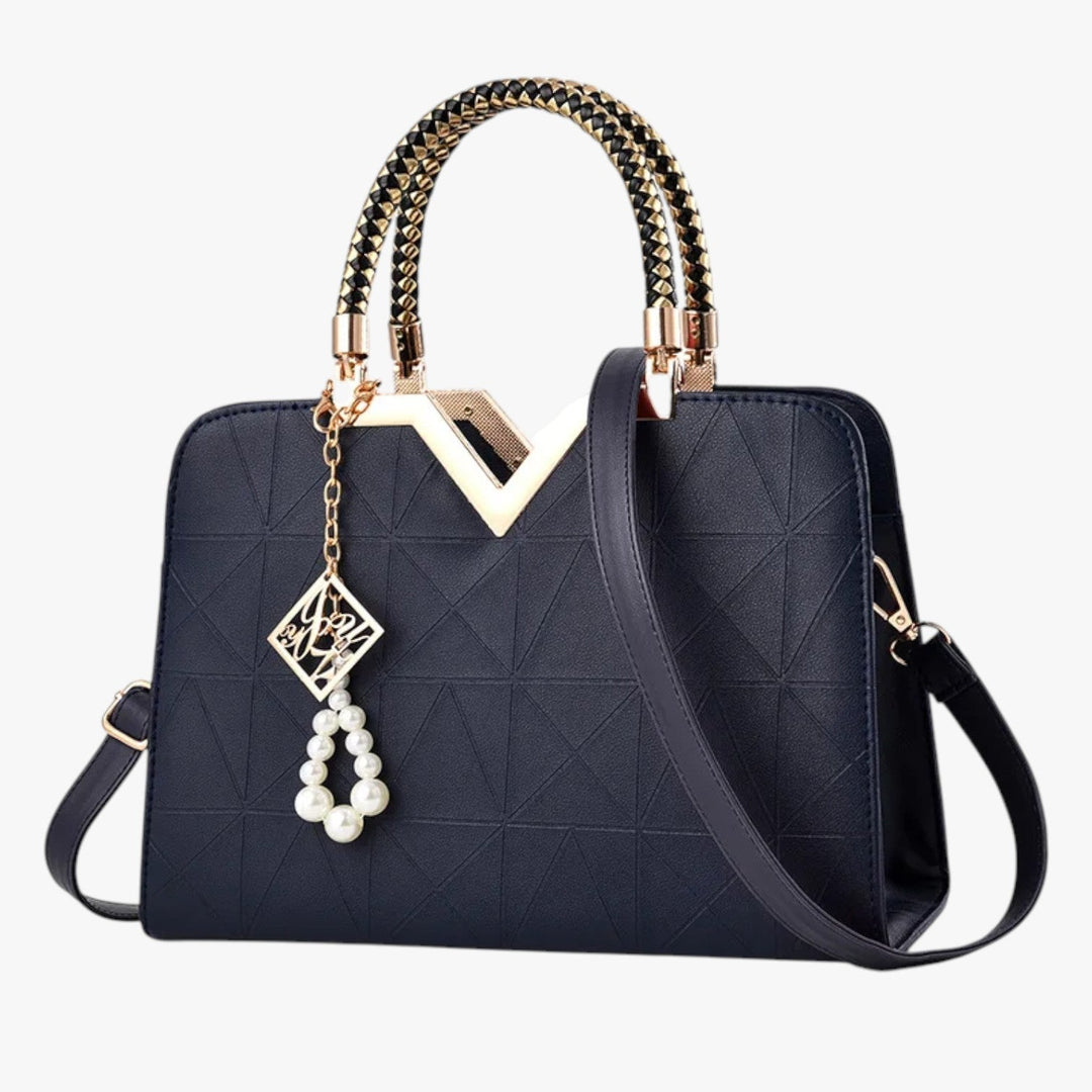 Borsa a mano da donna, finitura elegante e manici gioiello. Completa il tuo look con stile.