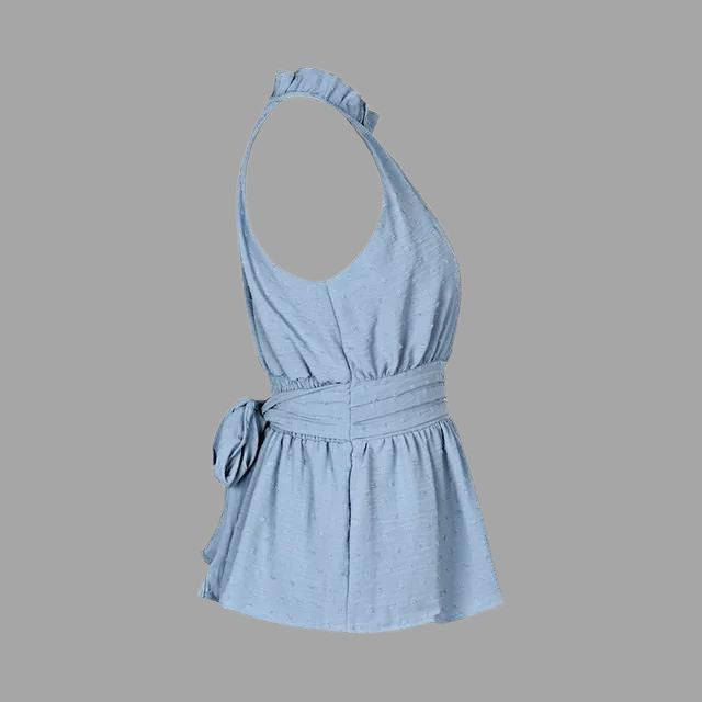 Confortevole haltertop donna blu, un capo versatile per la moda estiva. Top elegante e senza maniche per outfit.