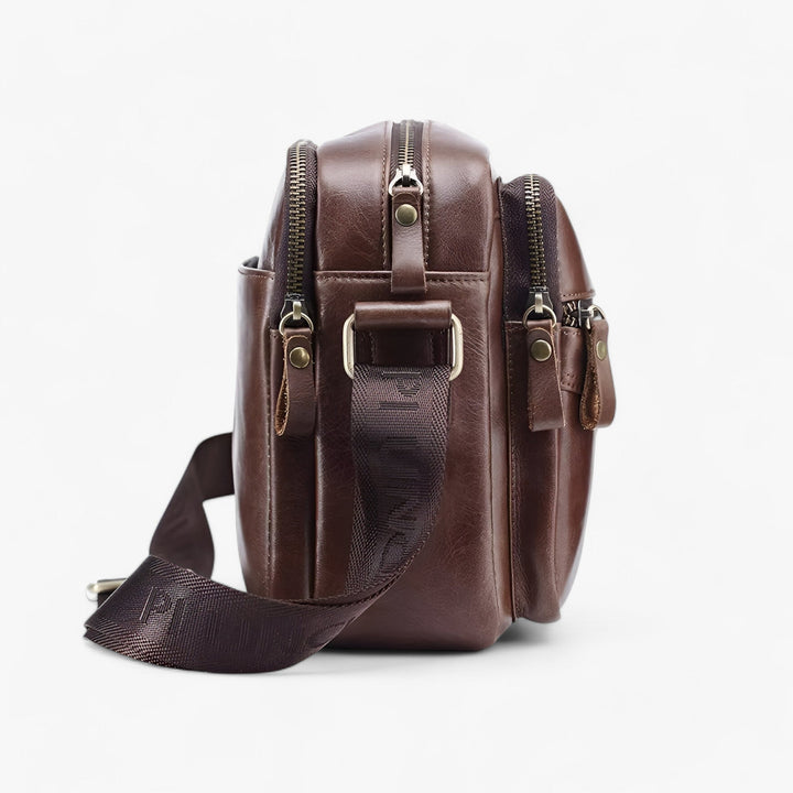 Borsa a tracolla unisex multiscomparto in tonalità caffè e nero, versatile accessorio per ogni outfit.