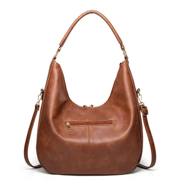 Borsa moda donna a tracolla in pelle vegana e velluto a coste, con nappine, un accessorio indispensabile.