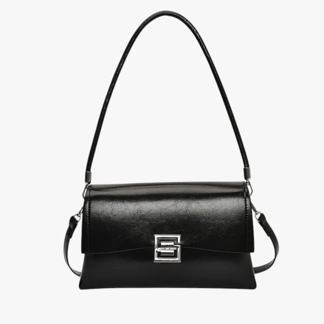Borsa a spalla rossa con chiusura frontale. Borsa donna elegante e pratica, con tracolla, per un tocco di colore.