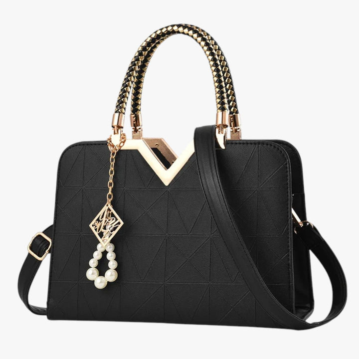 Accessorio moda donna: borsa a mano elegante con manici gioiello, versatile e glamour.