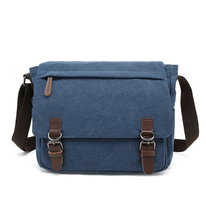 Borsa uomo resistente in tela, con tracolla regolabile e multitasche per organizzazione.
