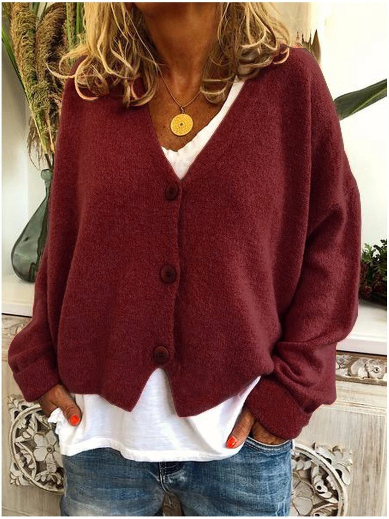 Cardigan donna in maglia, lungo e confortevole. Un capo versatile per la moda quotidiana, perfetto per ogni stagione.