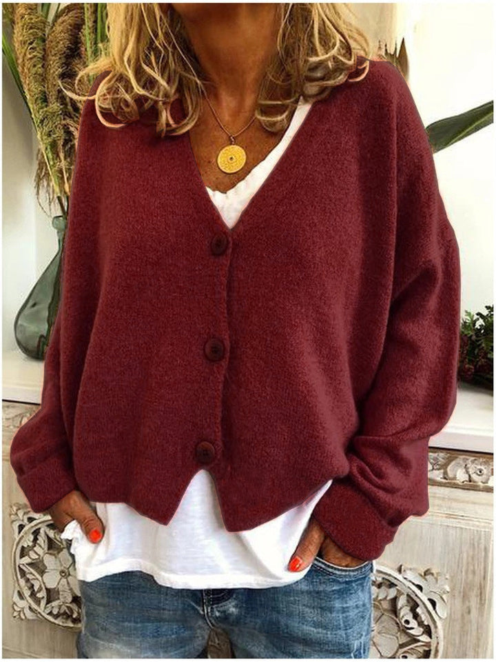 Cardigan donna in maglia, lungo e confortevole. Un capo versatile per la moda quotidiana, perfetto per ogni stagione.