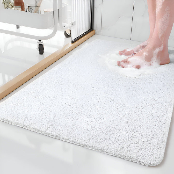 Tappetino antiscivolo per doccia e bagno, offre comfort morbido e sicurezza igienica per tutta la famiglia.