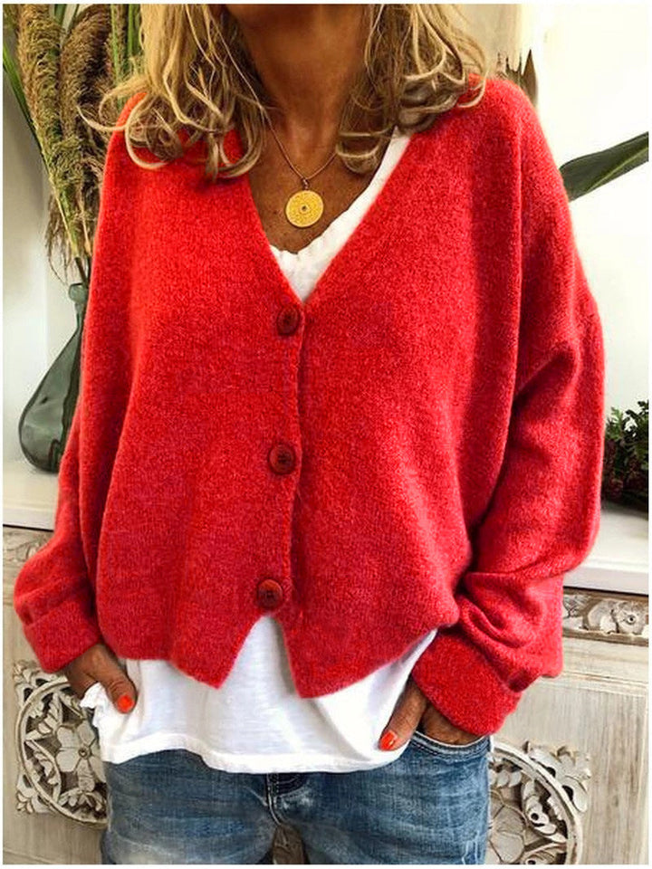 Cardigan donna elegante in maglia, un capo di moda versatile che completa ogni outfit per primavera e autunno.
