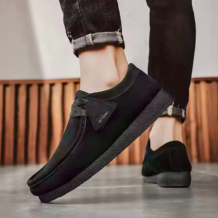 Scarpe mocassini uomo slip-on dal design elegante, ideali per comfort casual e quotidiano con suola ammortizzata.