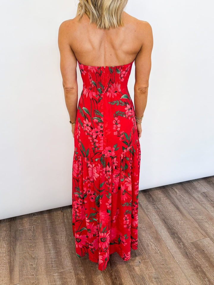 Vestito donna lungo floreale senza spalline, elegante per cerimonia o casual per una vacanza estiva. [[lstfy-media:5]]