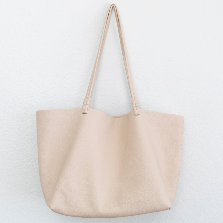 Borsa a tracolla donna, indispensabile per la routine quotidiana e l'ufficio.