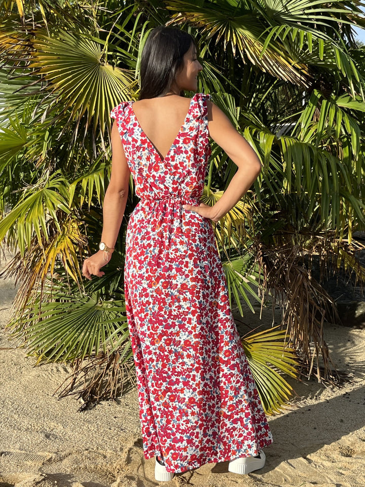 Vestito lungo donna estivo color rosso, fantasia floreale e nodo decorativo sulla spalla. Ideale per occasioni eleganti.