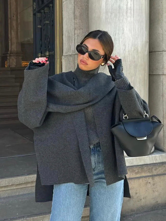 Cappotto invernale donna grigio carbone, collo a scialle, design avvolgente. Capospalla elegante per un look raffinato.